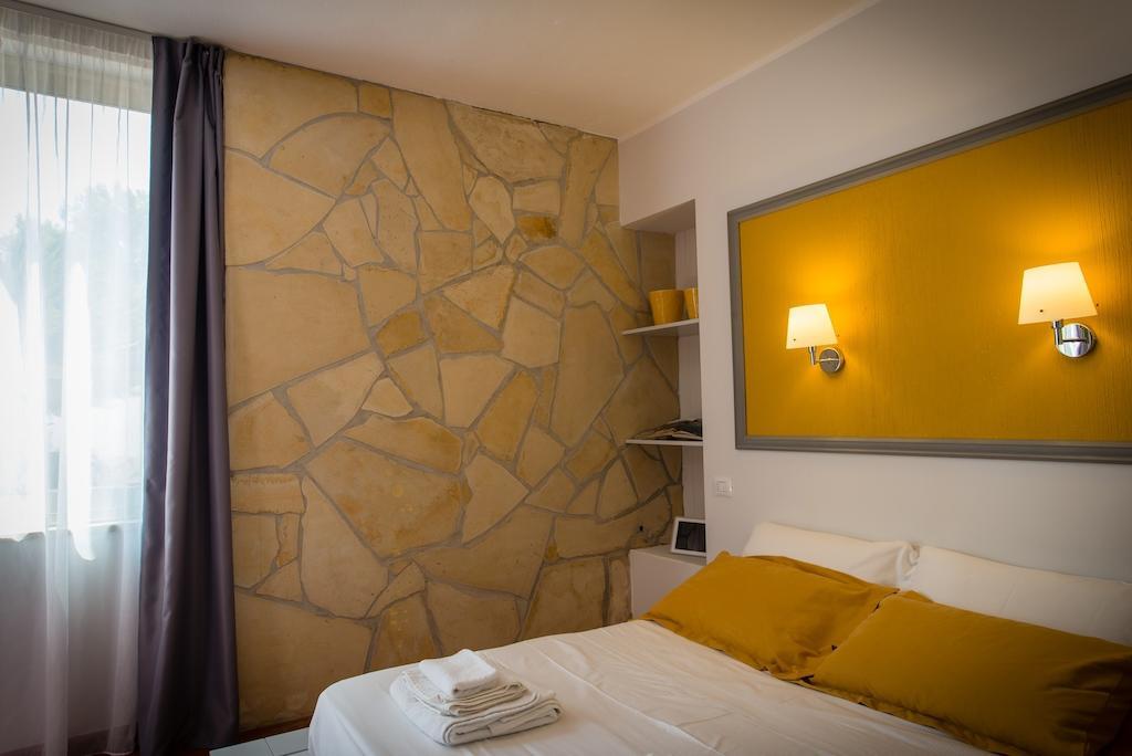 Birkin Apartments Cagliari Rum bild